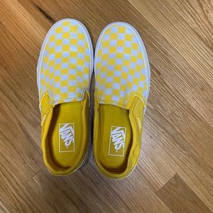 Yellow checkerboard vans slip on